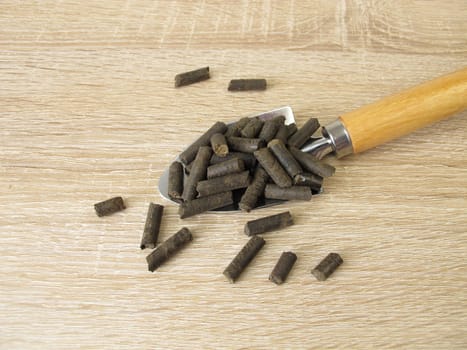 Sustainable, natural horse manure pellets as ecological fertilizer for plants