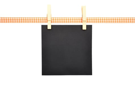 Background with orange-white checkered ribbon and paper
