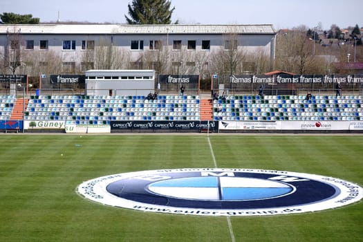 Pirmasens, Germany - March 30, 2019: The modern and colorful seats of a tribune of the sports park Husterhoehe of the soccer club FK Pirmasens on March 30, 2019 in Pirmasens..