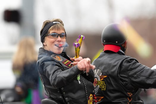 St. Louis, Missouri, USA - March 2, 2019: Bud Light Grand Parade, Members of Fire and Iron, motorcycle club going down 7th street