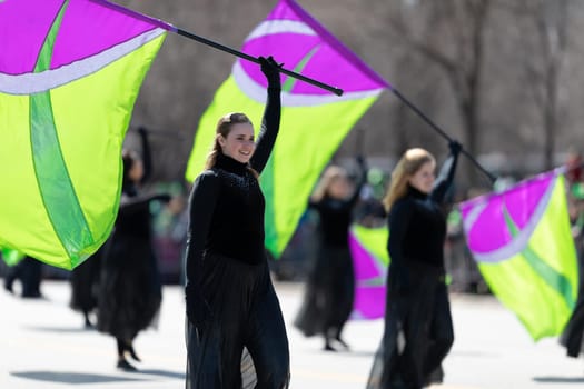 Chicago, Illinois, USA - March 16, 2019: St. Patrick's Day Parade, Onalaska High Shcool Marching Hilltoppers, performing at the parade