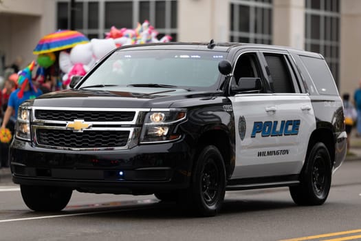 Wilmington, North Carolina, USA - April 6, 2019: The North Carolina.Azalea Festival, Chevrolet suburban K-9 Unit from the Wilmington Police driving down the street