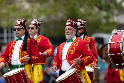 Wilmington, North Carolina, USA - April 6, 2019: The North Carolina.Azalea Festival, Members of the Drum and Bugle Corps, performing at the parade
