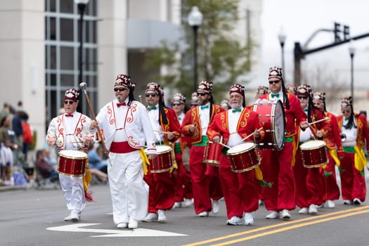 Wilmington, North Carolina, USA - April 6, 2019: The North Carolina.Azalea Festival, Members of the Drum and Bugle Corps, performing at the parade