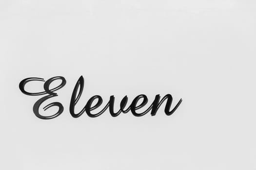 Number Eleven sign metal plate decor black and white.