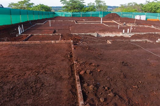 Construction design of new house foundations layout earth works soil  for rooms and plumbing pipes