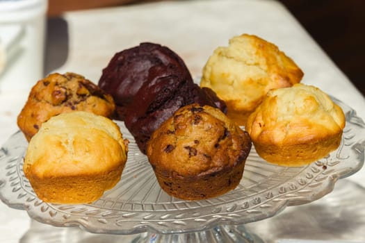 Muffins cookies on tray closeup food desert treat flavors closeup outdoors