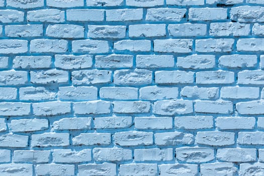 Brick wall painted blue outside decor texture detail color closeup background building structure..