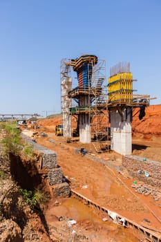 Building industry new traffic road intersection junction overhead flyover ramps construction of concrete steel design.