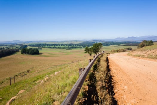 Mountains rural valley hills farming crops terrain scenic summer landscapes..