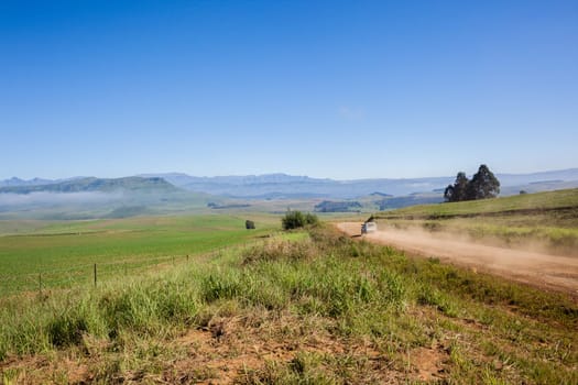 Mountains rural valley hills farming crops terrain scenic summer landscapes..