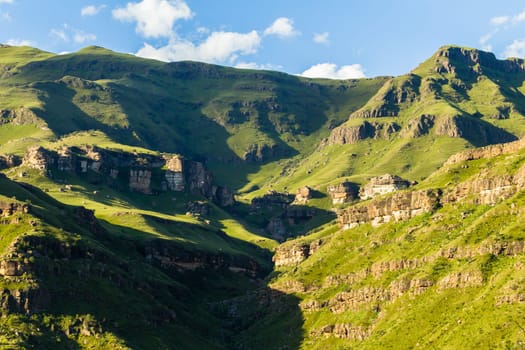 Mountains rock cliffs hills valley summer scenic rural landscape.