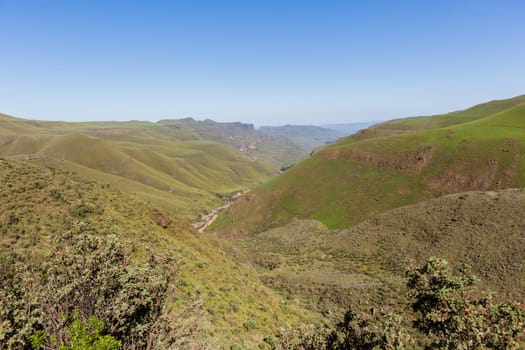 Mountain high dirt road pass from river valley up or down by four wheel vehicle  summer landscape