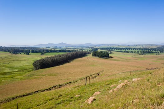 Mountains rural valley hills farming crops terrain scenic summer landscapes..