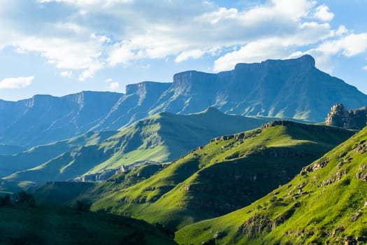 Mountains valley river rocky cliffs rural countryside scenic summer landscape.
