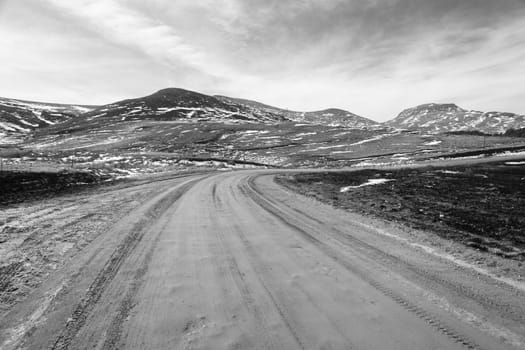 Mountains Snow dirt road tracks route rural landscape