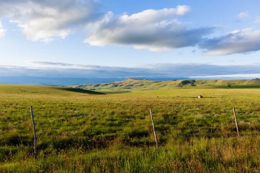 Mountains farmlands scenic valley plateau landscape late summer afternoon landscape..