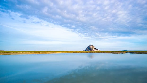 Mont-Saint-Michel and the bay at dawn in Normandy, France