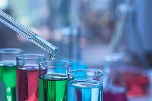 Glass laboratory chemical test tubes with liquid for analytical , medical, pharmaceutical and scientific research concept.