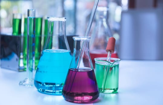 Glass laboratory chemical test tubes with liquid for analytical , medical, pharmaceutical and scientific research concept.