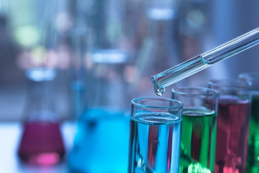 Glass laboratory chemical test tubes with liquid for analytical , medical, pharmaceutical and scientific research concept.