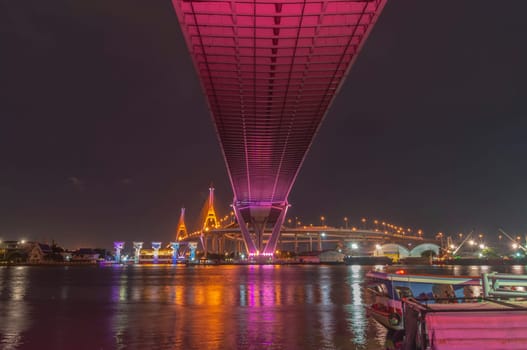 Bhumibol Bridge, Chao Phraya River Bridge. Turn on the lights in many colors at night.