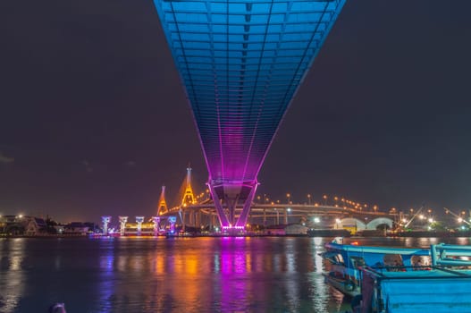 Bhumibol Bridge, Chao Phraya River Bridge. Turn on the lights in many colors at night.