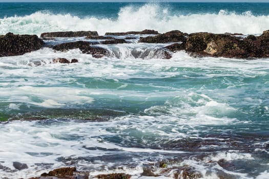 Beach Rocky ocean coastline tidal water pools closeup nature landscape..
