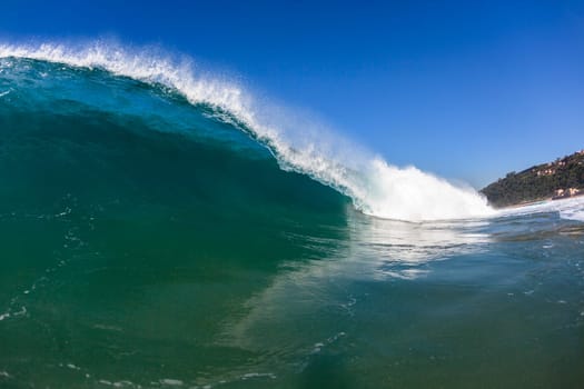 Wave lip crashing curling face to face encounter crashing ocean water power