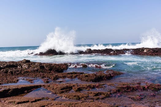 Beach Rocky ocean coastline tidal water pools closeup nature landscape..