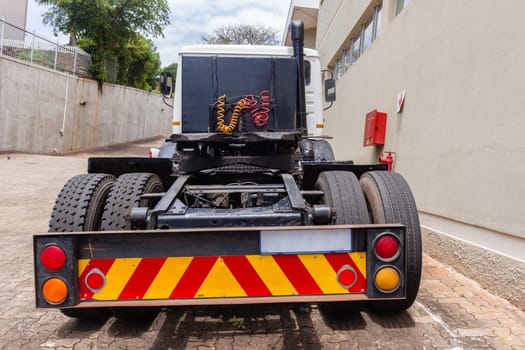 Truck vehicle horse without large cargo trailer parked closeup yard..