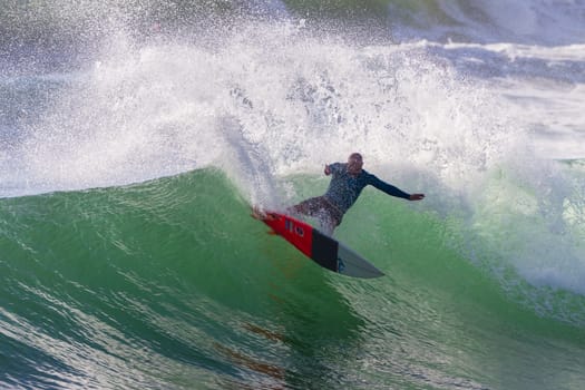 Surfing surfer closeup wave action water photo.