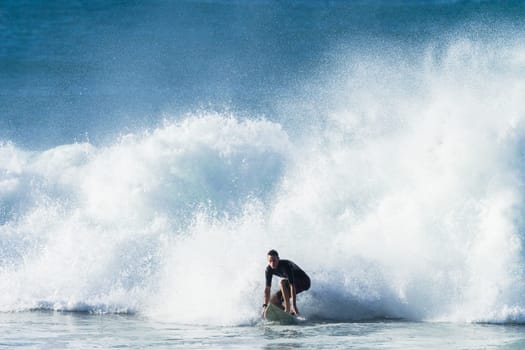 Surfing surfer closeup wave action water photo.