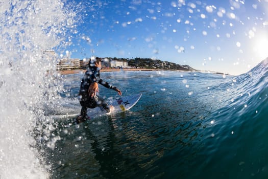 Surfing surfer closeup wave action water photo.
