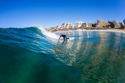 Girl Surfing surfer wave closeup water swimming action photo.