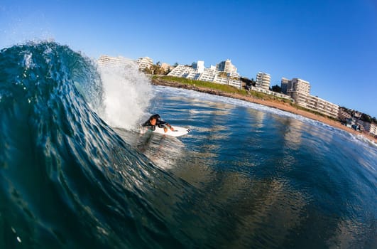 Surfing surfer closeup wave action water photo.