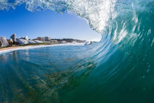 Surfing surfer wave inside water swimming action photo Ballito-Bay beach landscape.
