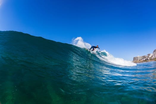 Surfing surfer closeup wave action water photo.