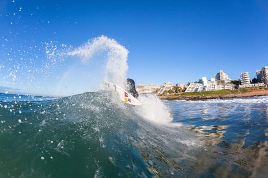 Surfing surfer closeup wave action water photo.