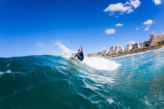 Surfing surfer closeup wave action water photo.