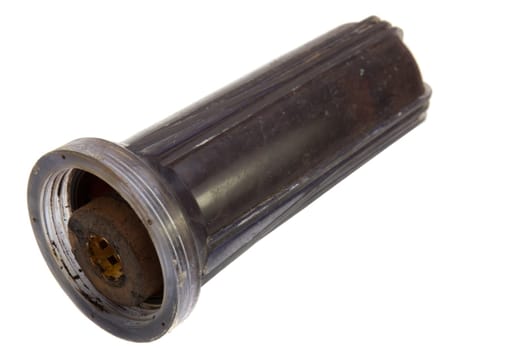 Old dirty water filter in plastic holder isolated on white background