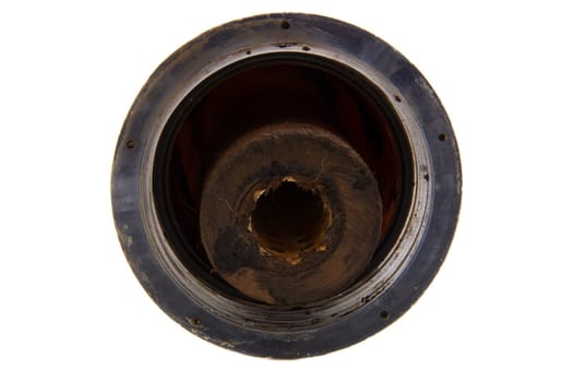 Old dirty water filter in plastic holder isolated on white background