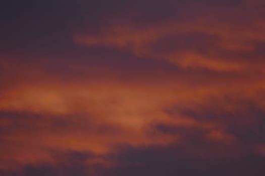 Fire-red lightly clouded sky, sunset, background