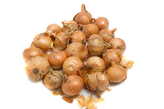 pile of natural onions with some small defects