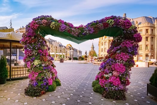 Flower arch on the Victory Square (Piata Libertatii) in Timisoara, Romania