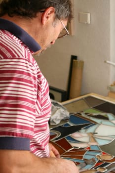 artist works with antique glass