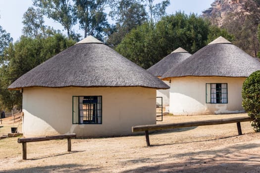 African style thatch grass  roofs round bungalow cottages buildings  holiday camps in rural mountains.