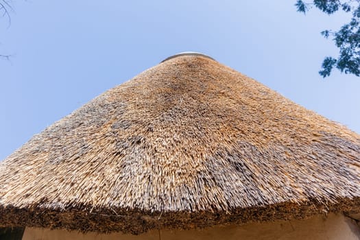 African style thatch grass  roofs round bungalow cottages buildings  holiday camps in rural mountains.