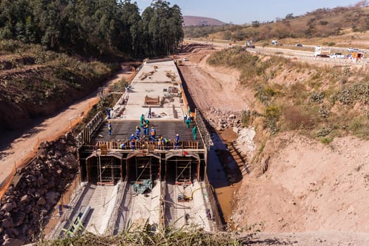 Constructionindustrial building of new road highway rain flooding water tunnels  halfway progress.