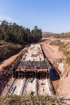 Constructionindustrial building of new road highway rain flooding water tunnels  halfway progress.